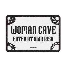 Sign: WOMAN CAVE